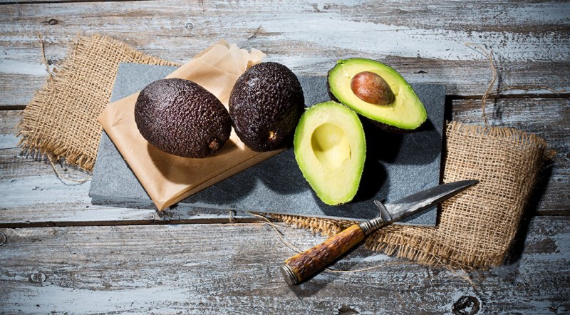 Man Cutting Avocado On A Wooden Cutting Board Personal Perspective Directly  Above View High-Res Stock Photo - Getty Images