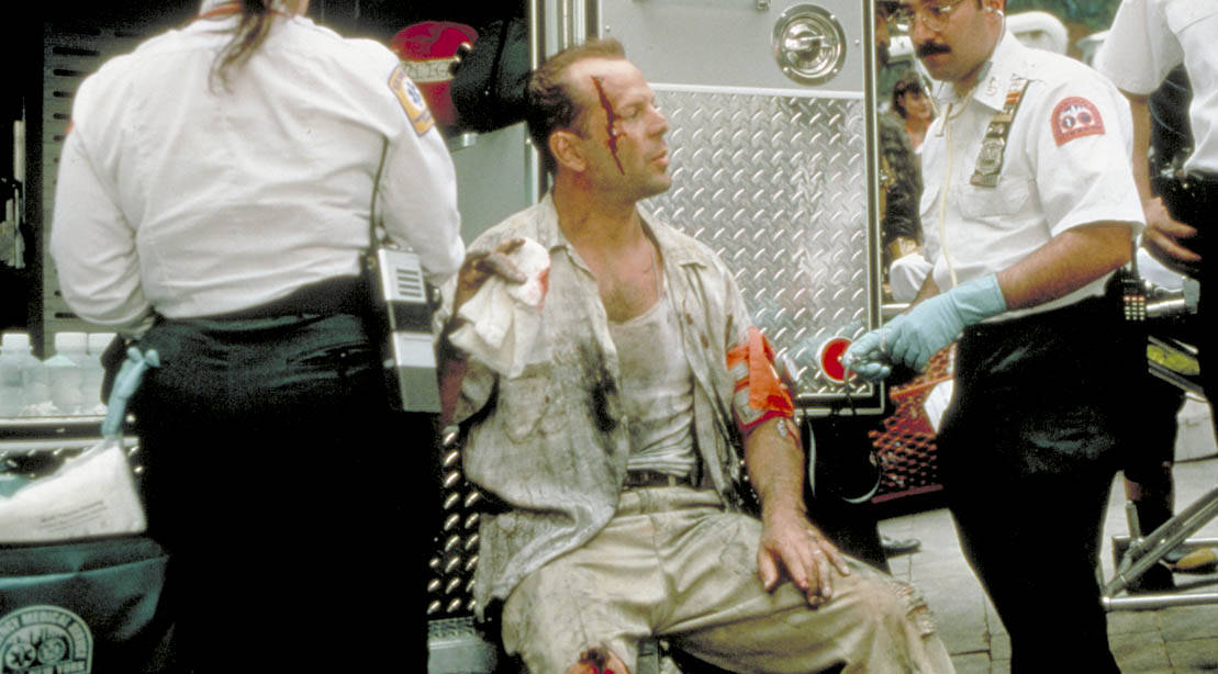 Bruce Willis playing Detective John McClain in the Movie Die Hard With a Vengeance