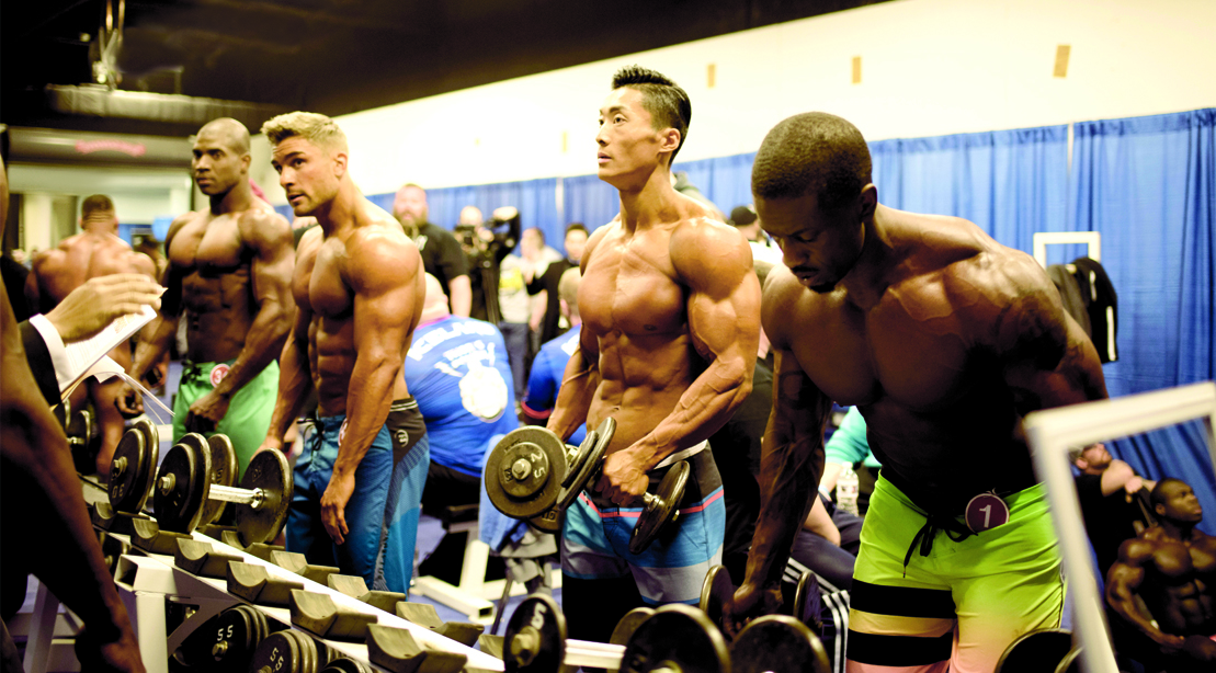 group of bodybuilders 2 female with 7 men