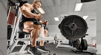 Bodybuilder Flex Lewis doing a calf raise exercise