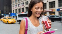 Girl-Drinking-Bottled-Vegetable-Juice-City