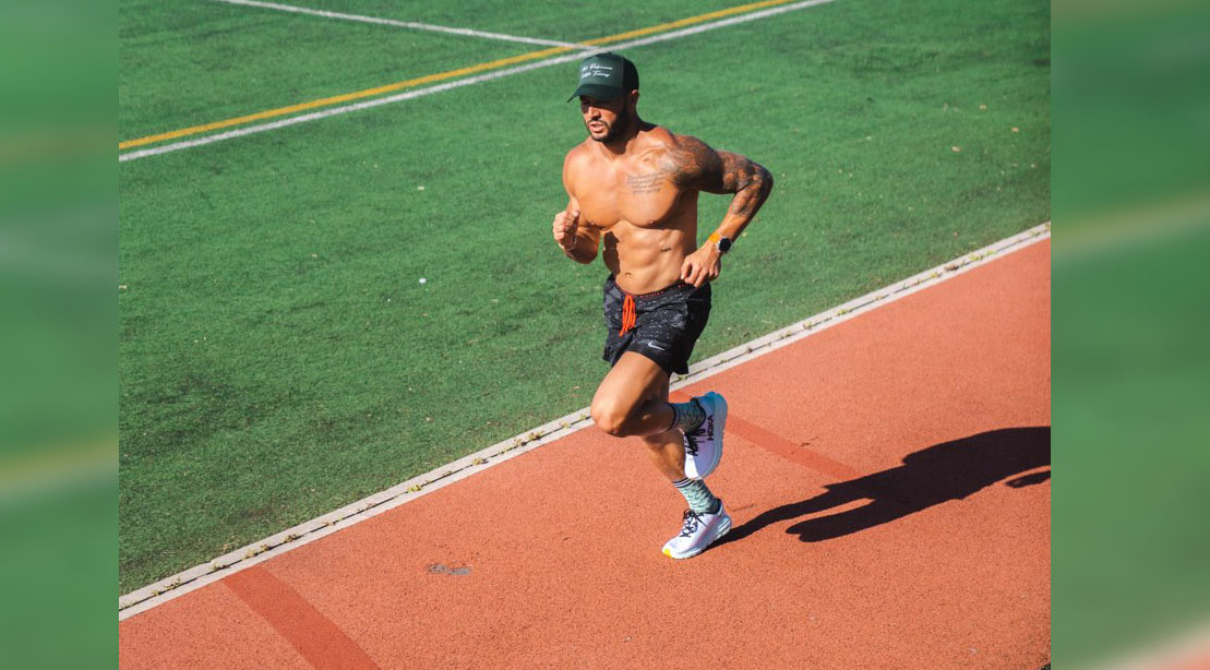 Brian Mazza running on a track field