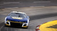 Chase Elliott racing in a NASCAR race